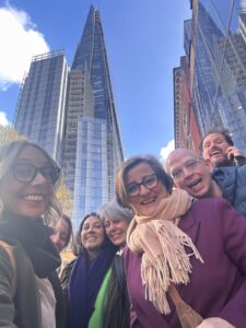 A photo of the Core Team at MSB smiling for a selfie on an away day in London in March 2026.