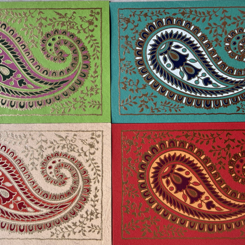 Some South Asian-designed paisley patterns repeated in different colours